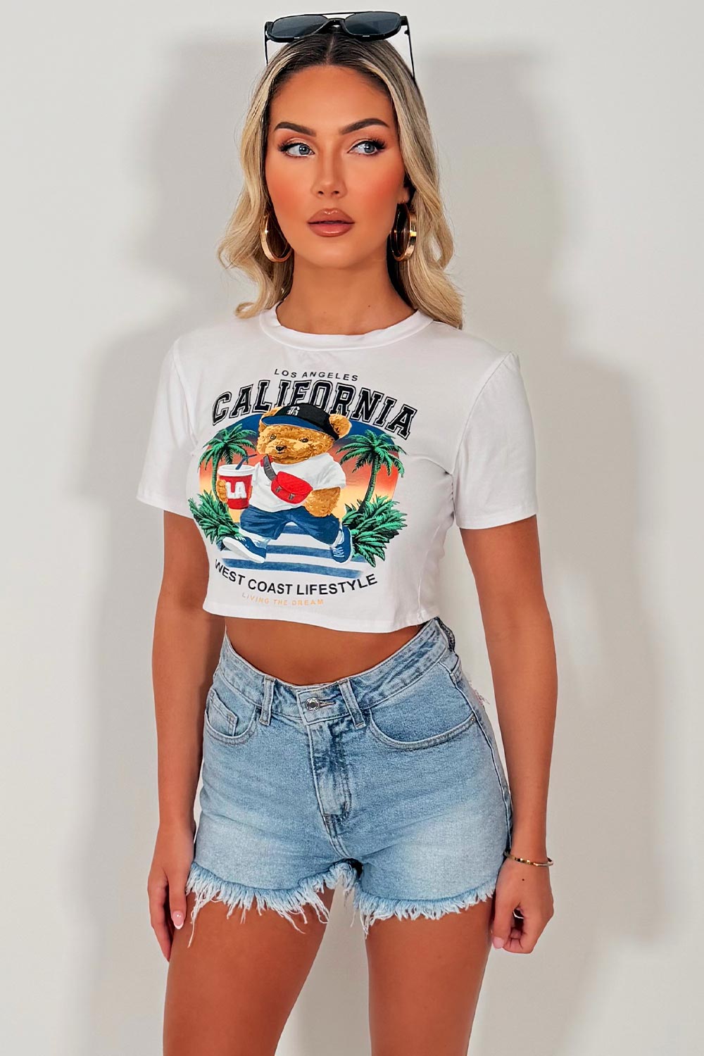 womens baby tee with graphic teddy california slogan