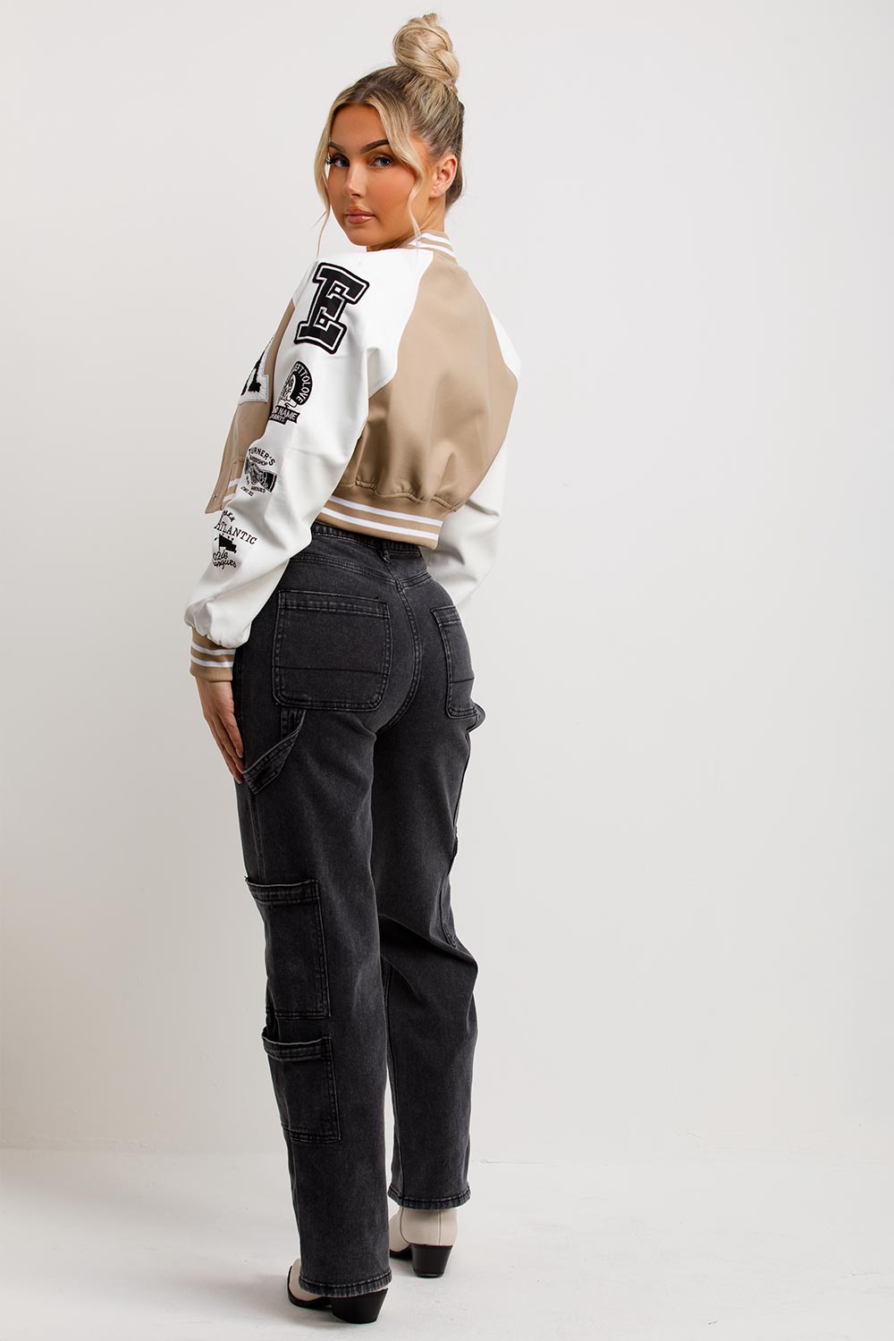 womens faux leather varsity bomber jacket with la slogan