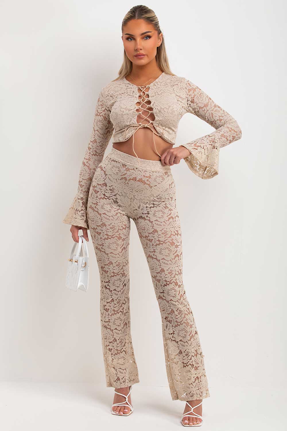 womens lace flare trousers and long flare sleeve lace up front crop top co ord set going out summer holiday rave festival outfit