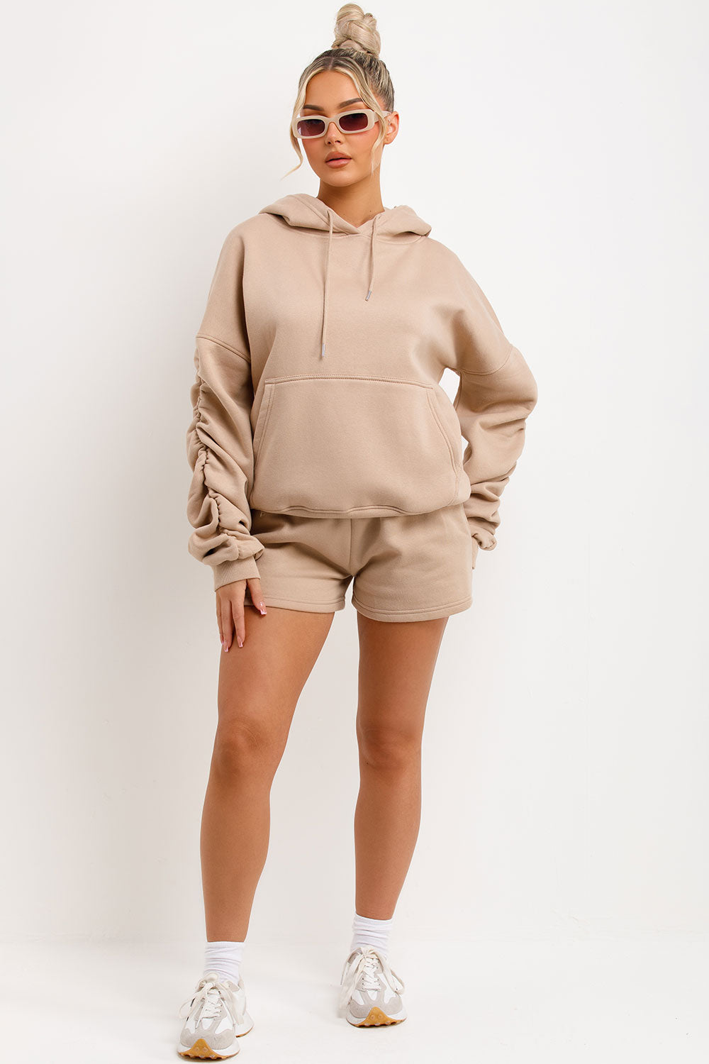 womens oversized ruched sleeve hoodie and shorts lounge set airport outfit
