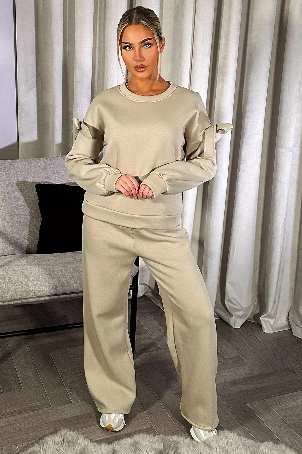 cut out bow detail sweatshirt and straight leg joggers two piece lounge set beige