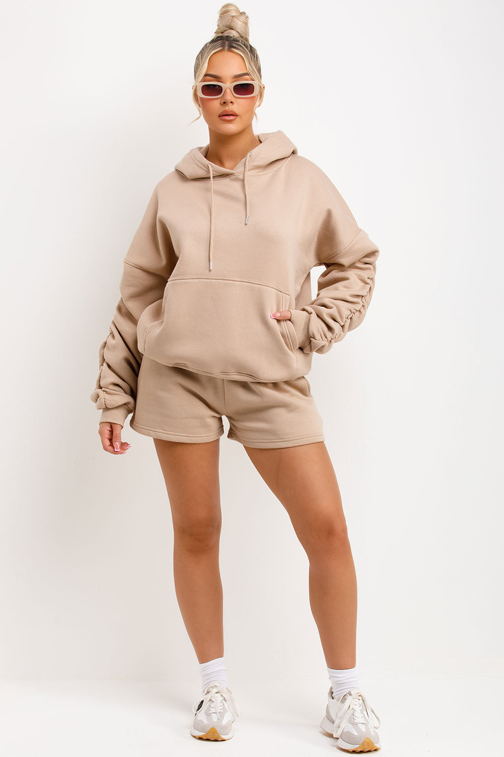 short tracksuit hoodie and shorts lounge set airport outfit