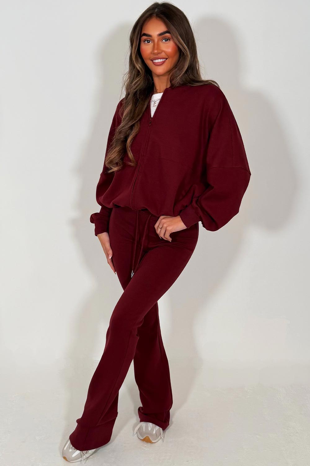 bomber sweatshirt and flare leg trouser tracksuit set burgundy
