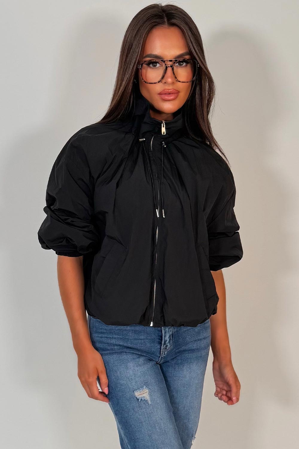 black funnel neck jacket with cinched waist womens transitional autumn winter windbreaker jacket uk styledup