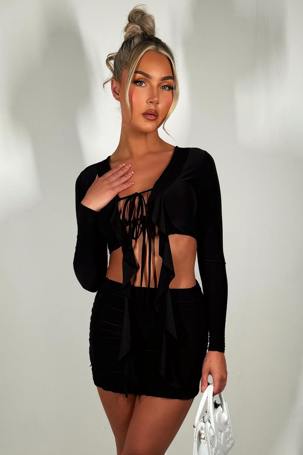 frilly skirt and long sleeve tie front crop top co ord set festival going out holiday outfit