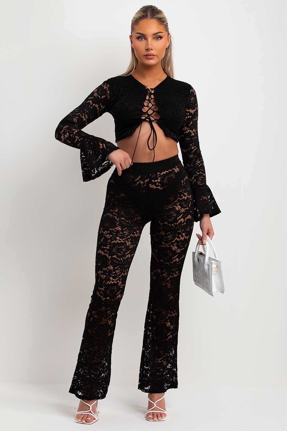 flare sleeve lace up front crop top and skinny flare lace trousers two piece co ord set going out summer rave festival holiday outfit