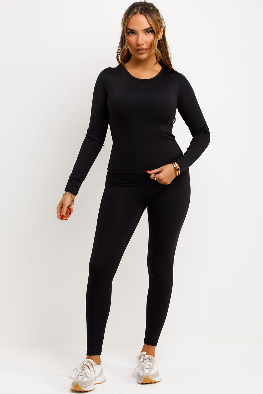 womens black sports top and seamless leggings two piece co ord set skims uk
