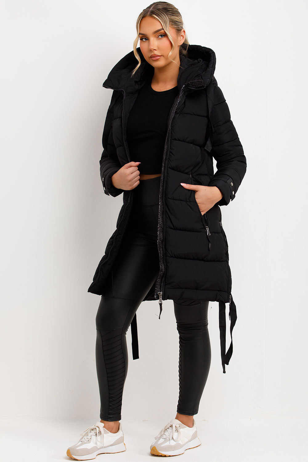 womens long puffer coat with zip pockets for winter styledup