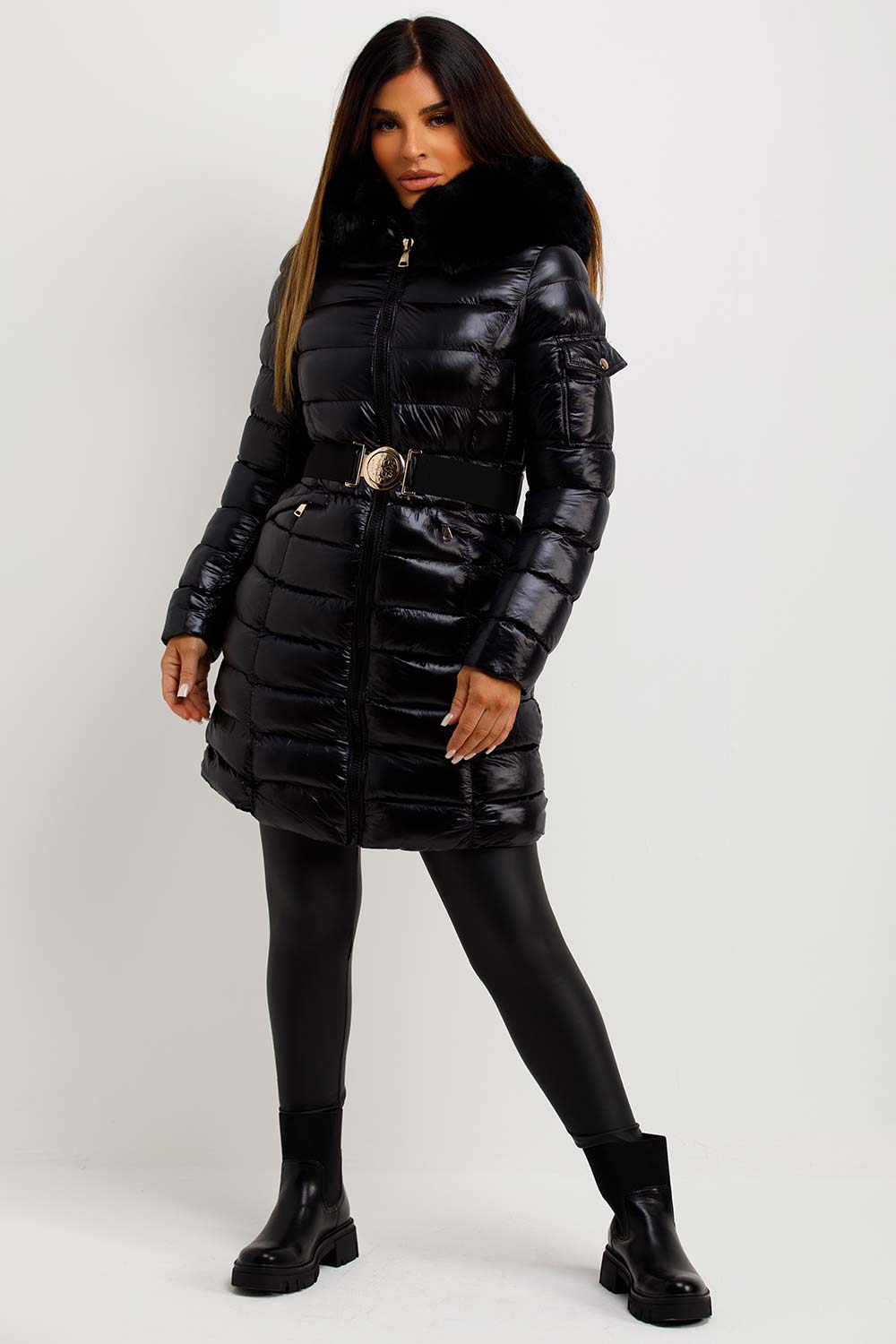 black puffer coat with fur hood and belt