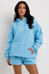 sky blue oversized hoodie and shorts tracksuit co ord loungewear set airport outfit