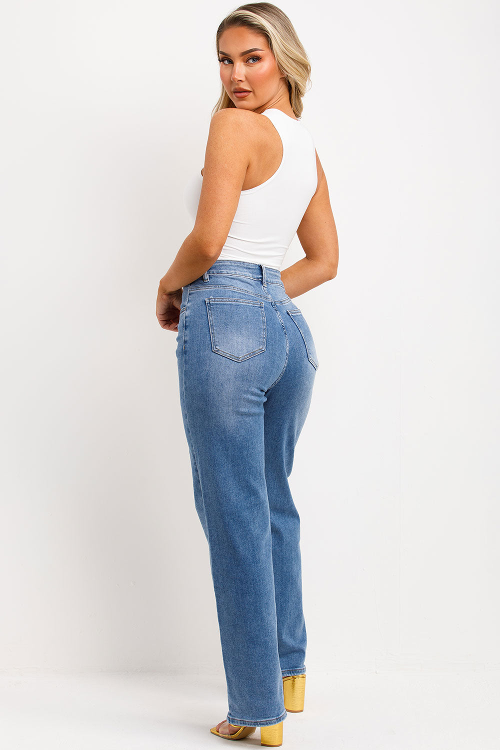 halter neck gold buckle going out top white bodysuit styled up