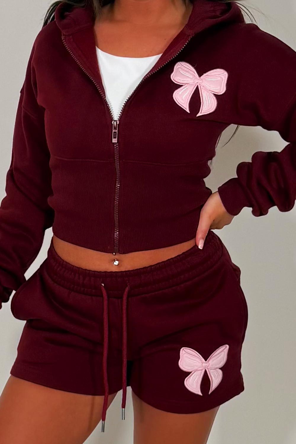 crop hoodie with cinched waist and shorts tracksuit with bow detail two piece co ord set airport outfit womens uk