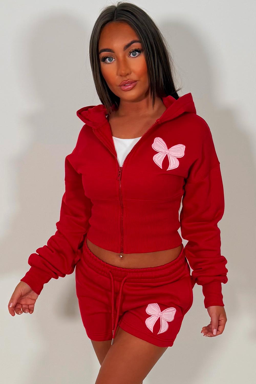 crop hoodie with cinched waist and shorts tracksuit with bow detail two piece co ord set airport outfit womens uk