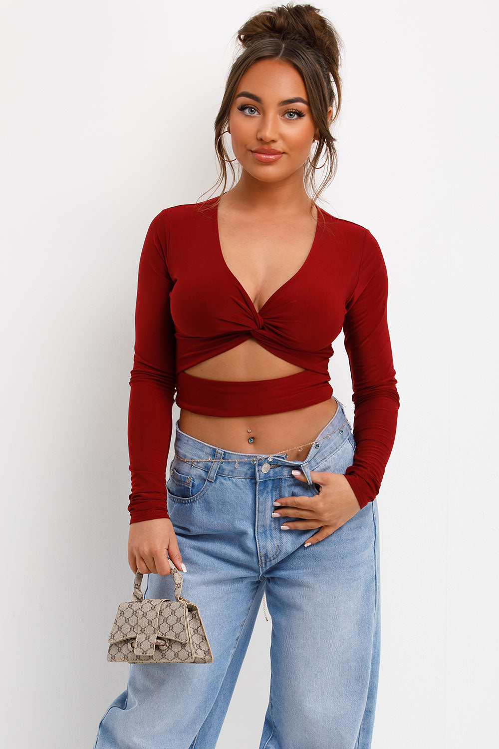 cut out long sleeve twist front festival top
