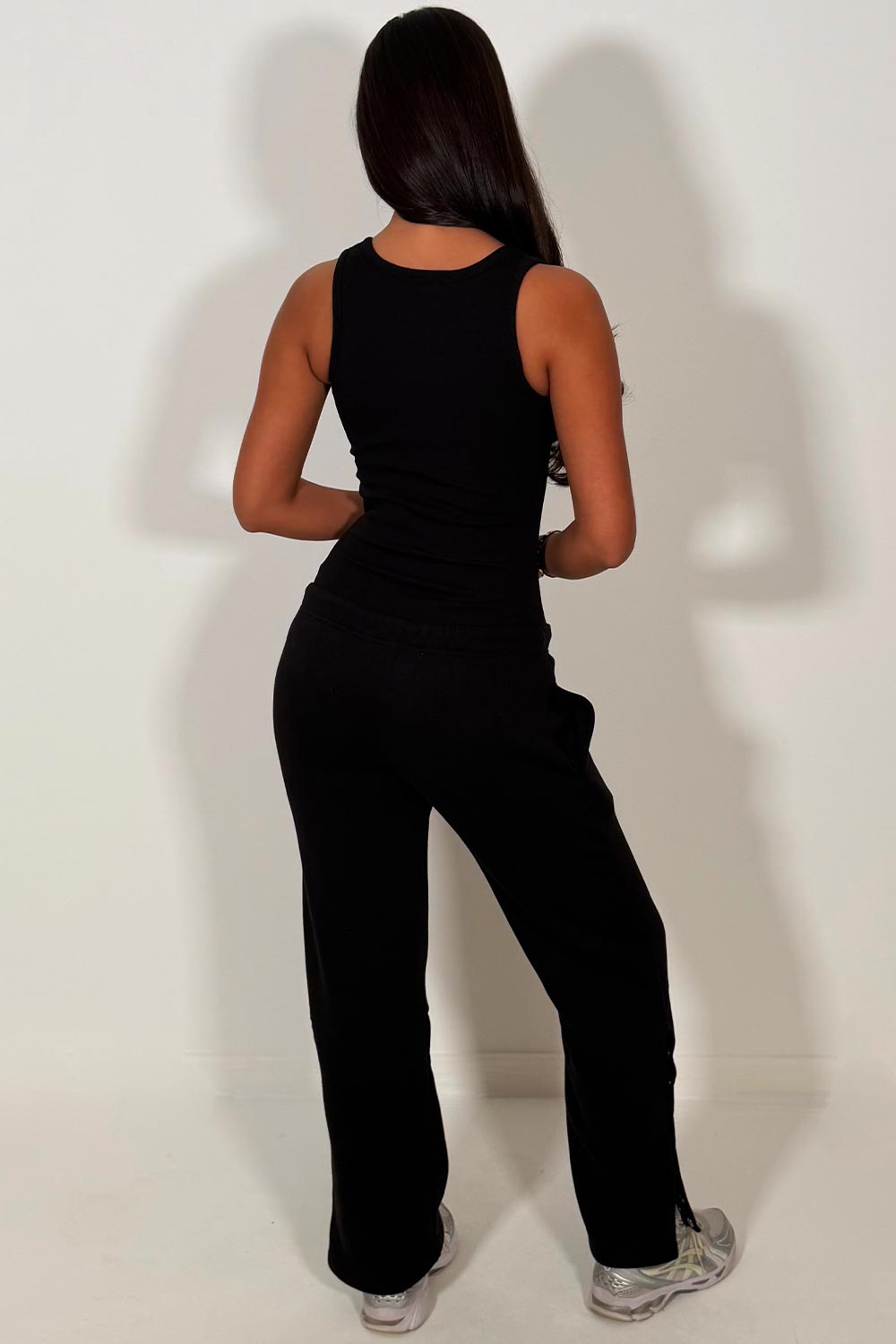 womens loungewear set black wide leg joggers and ribbed bodysuit top tracksuit airport outfit