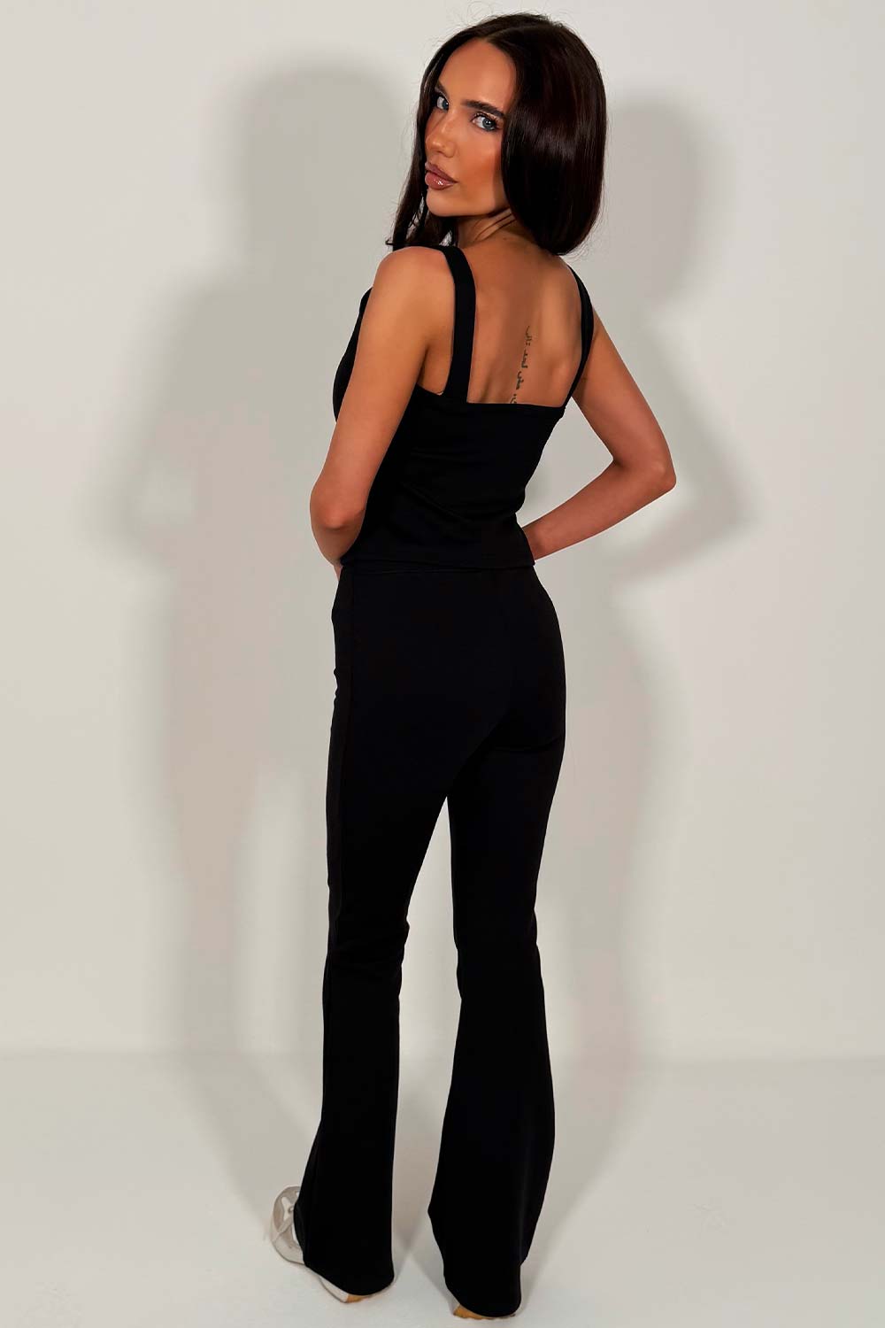 black flare trousers and button up top two piece co ord set pink styledup