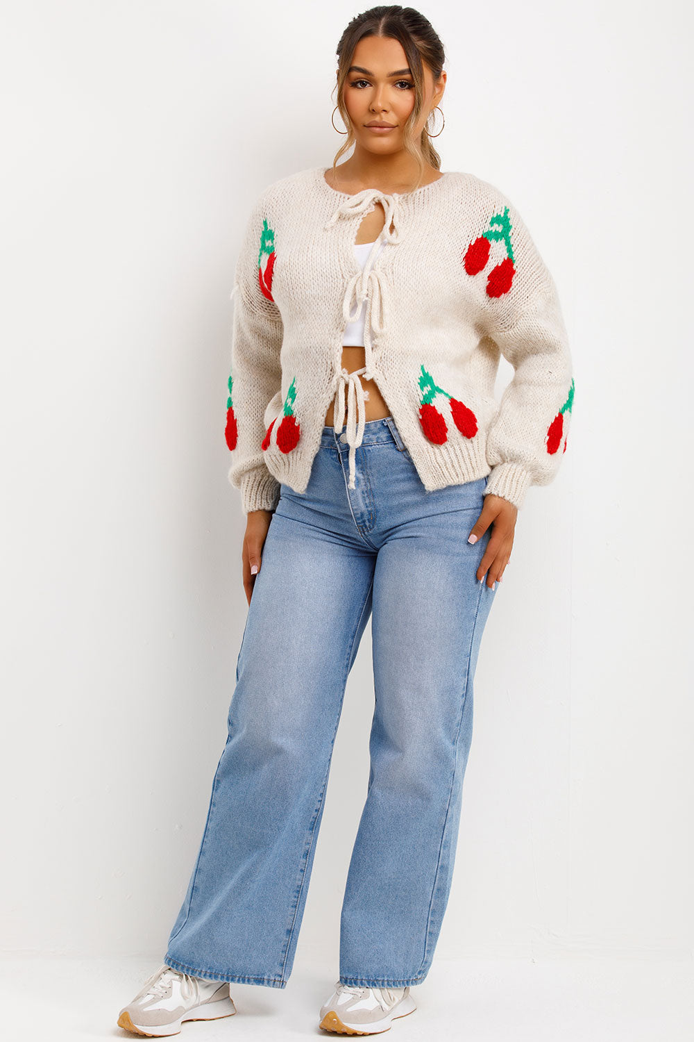 knitted cardigan with cherries tie knot front styledup