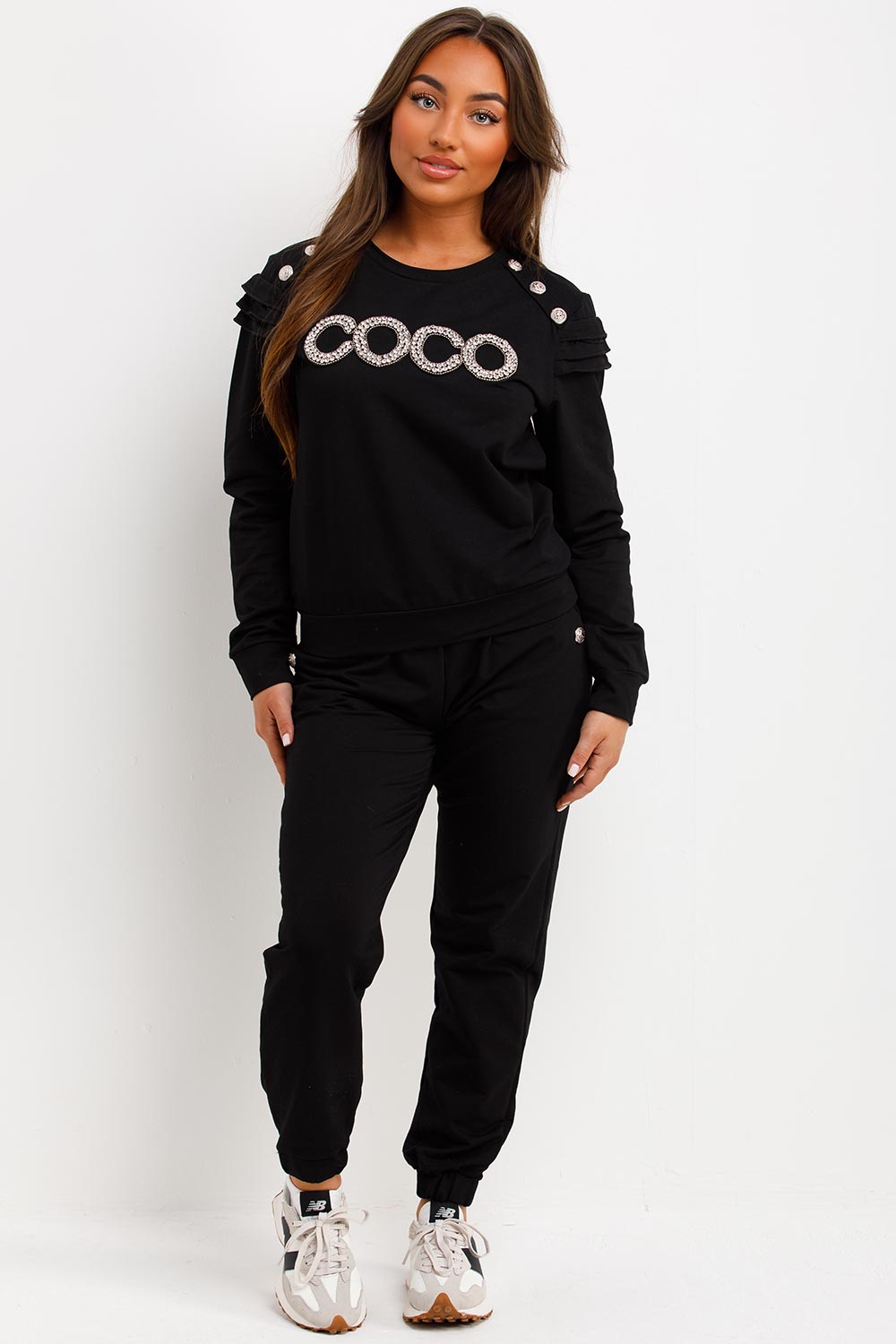 frill shoulder gold button top and trousers tracksuit set airport outfit