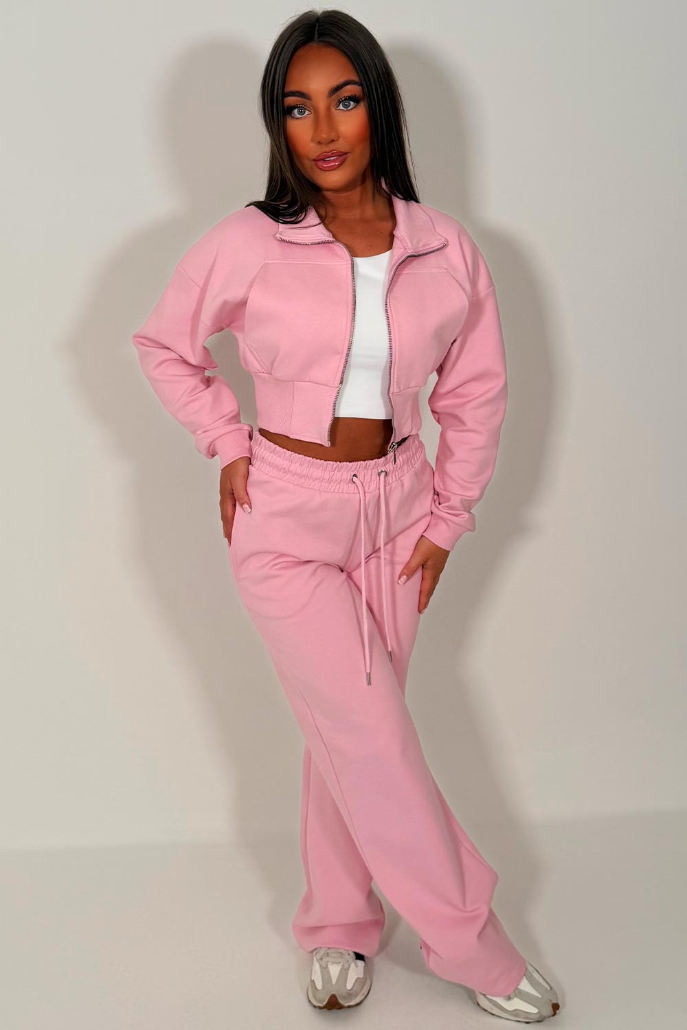 womens pink crop sweatshirt and wide leg joggers tracksuit airport outfit casual everyday outfit styledup uk