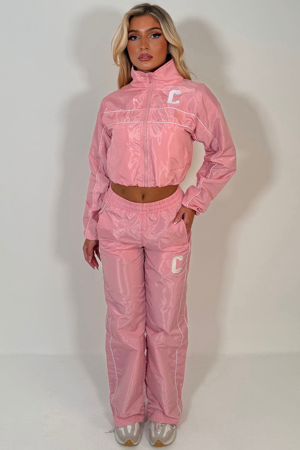pink crop funnel neck jacket and track trousers summer holiday festival outfit styledup uk