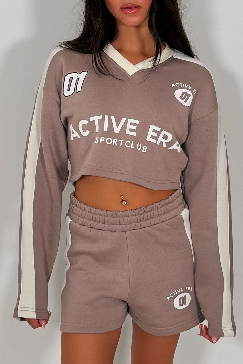 crop tracksuit with graphics and stripes styledup womens summer holiday trendy airport outfit styledup uk