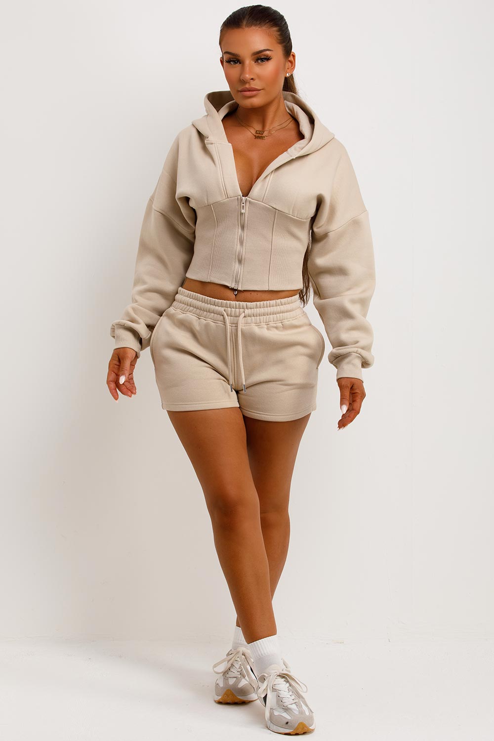 cinched waist crop corset hoodie and shorts tracksuit airport outfit co ord