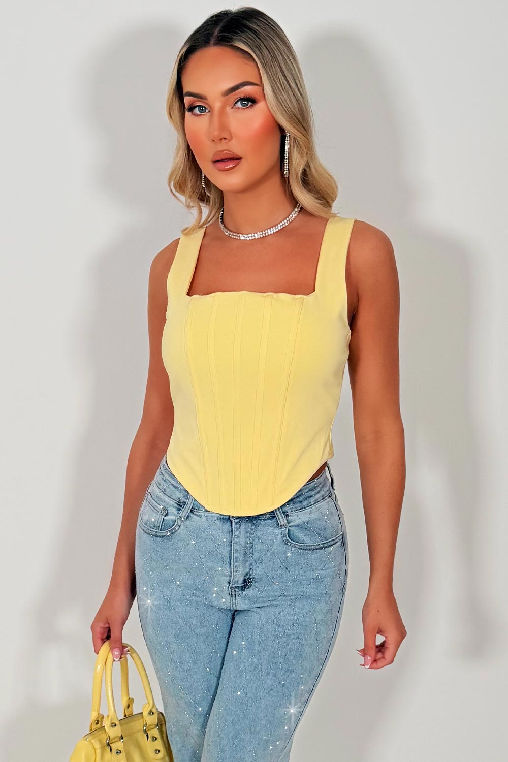yellow corset top with tie back goiong out festival crop top styledup uk