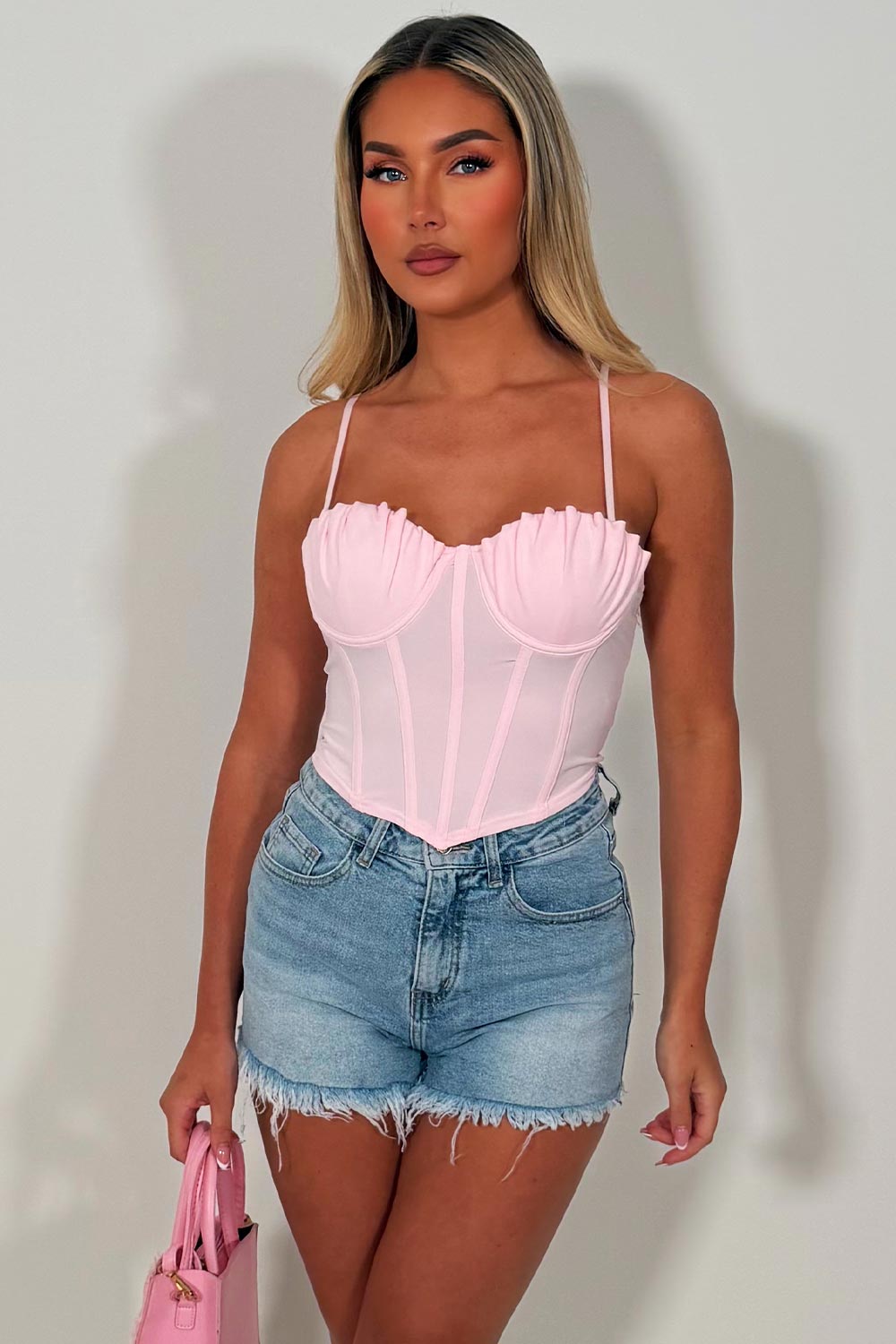pink bustier corset top with straps going out festival night out outfit styledup