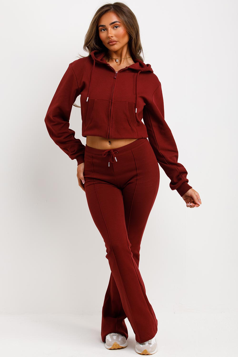 interlock sweatshirt and bell bottom top stitched trousers two piece loungewear set