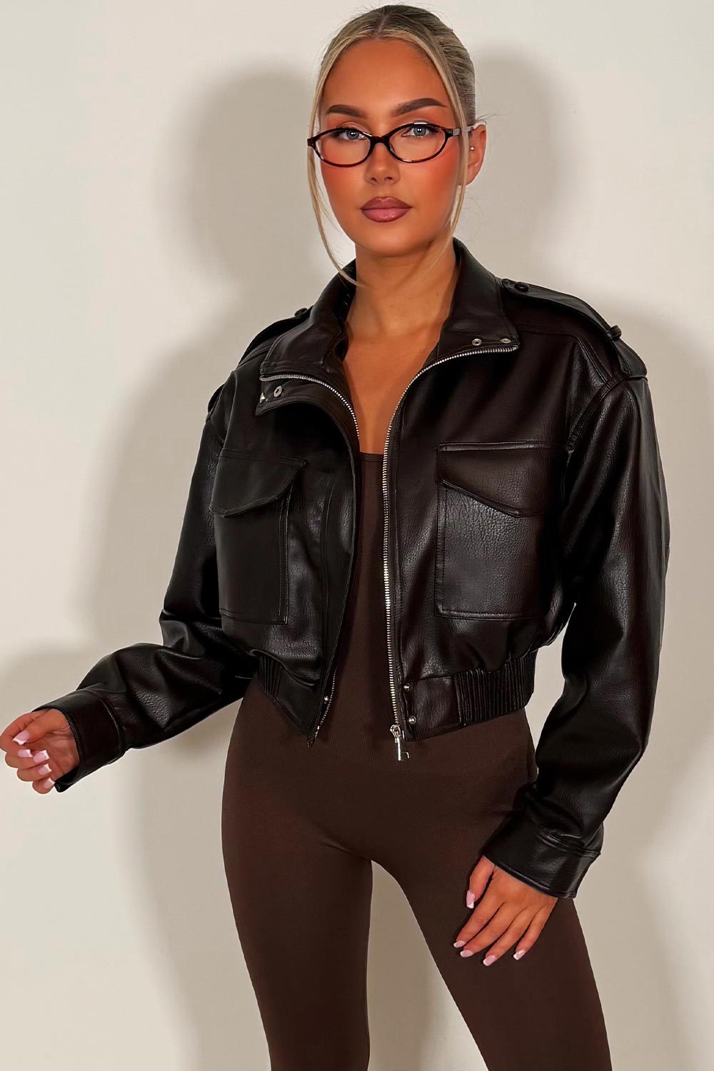 zara womens short jacket with high collar long sleeves shoulder tabs pockets on front brown faux leather