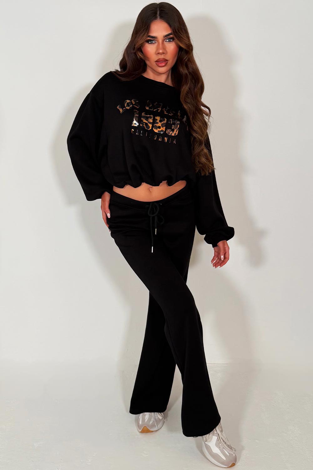womens oversized crop sweatshirt and bell bottom flare trouser two piece loungewear co ord set black with los angeles california slogan styledup