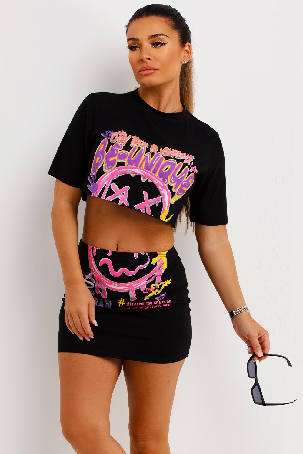 crop top and mini skirt rave festival neon outfit with be unique graphic print