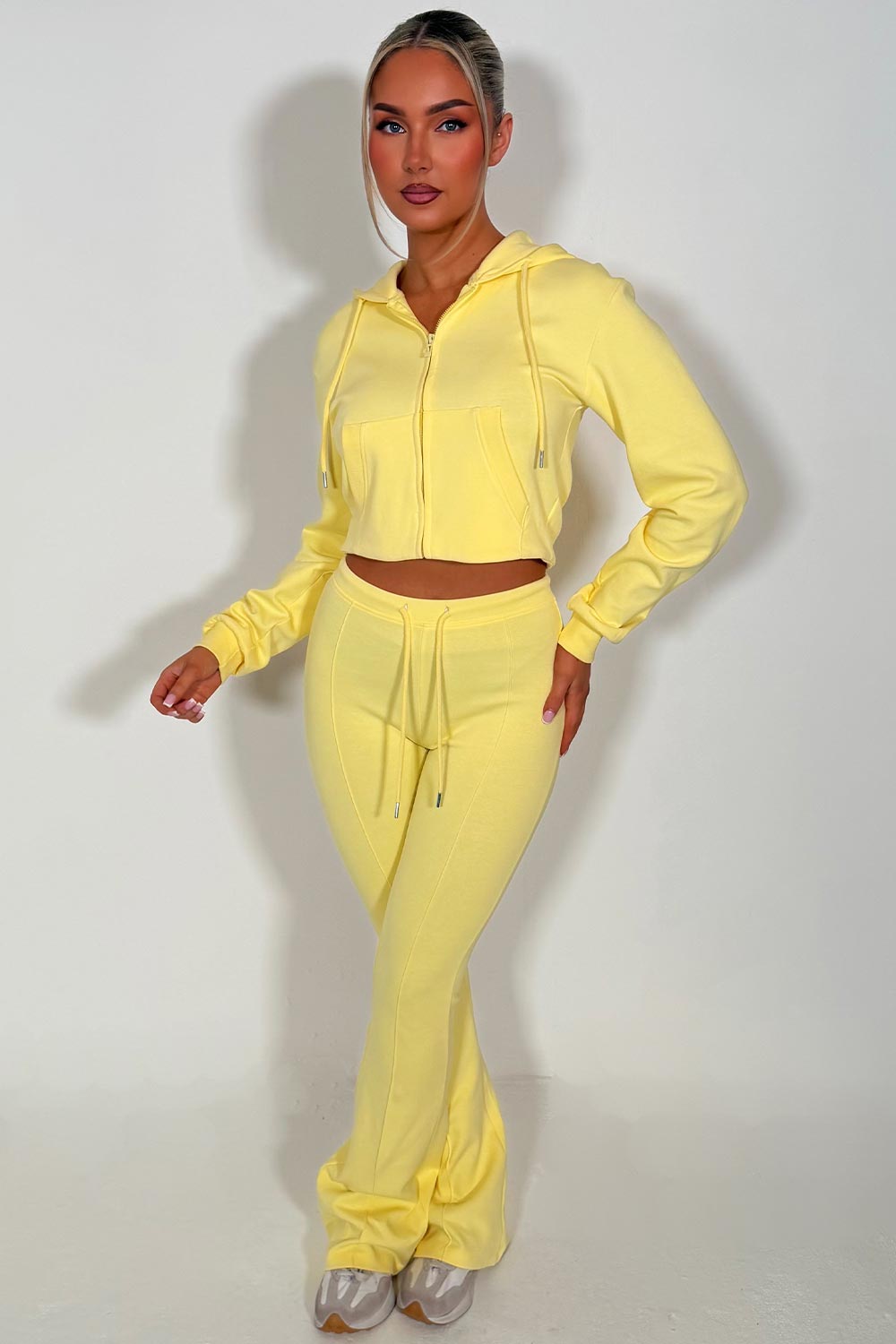 interlock sweatshirt and bell bottom top stitched trousers two piece loungewear set