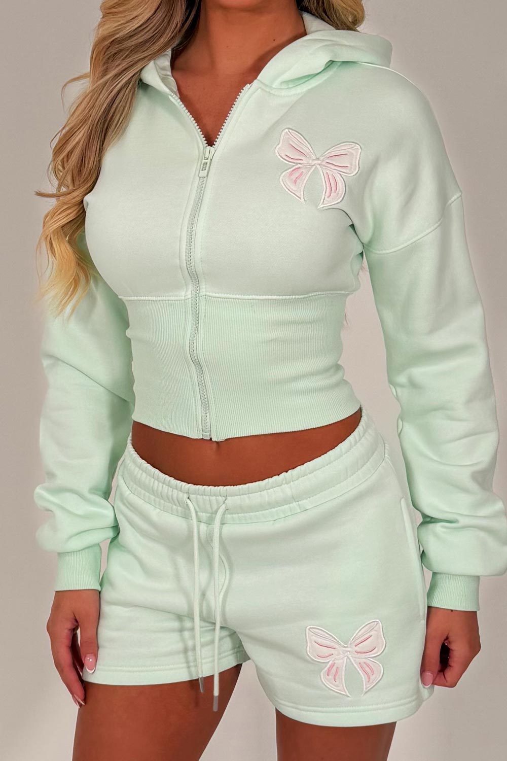womens cinched waist crop corset hoodie and shorts tracksuit bow detail airport outfit co ord white fox uk