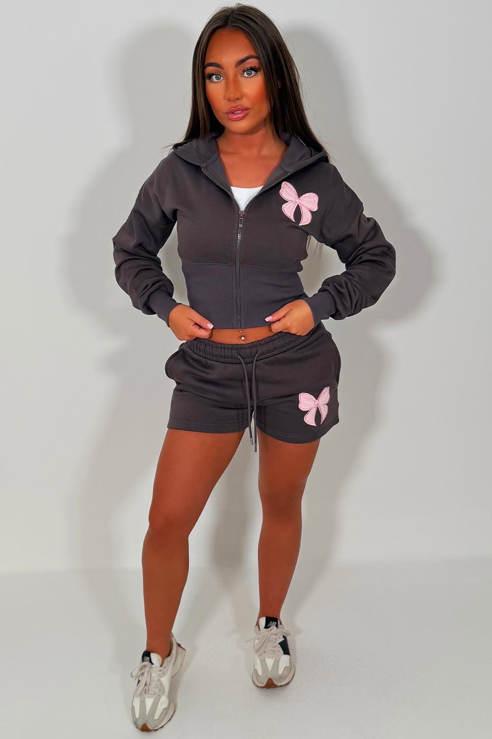 womens cinched waist crop corset hoodie and shorts tracksuit bow detail airport outfit co ord