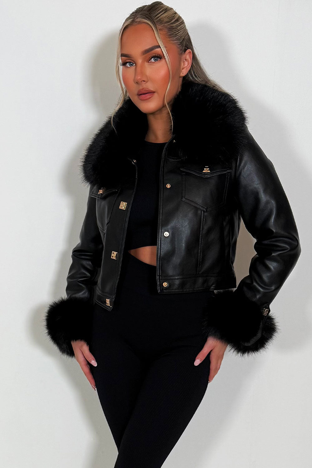 fur cuff and collar faux leather jacket with gold buttons styled up womens