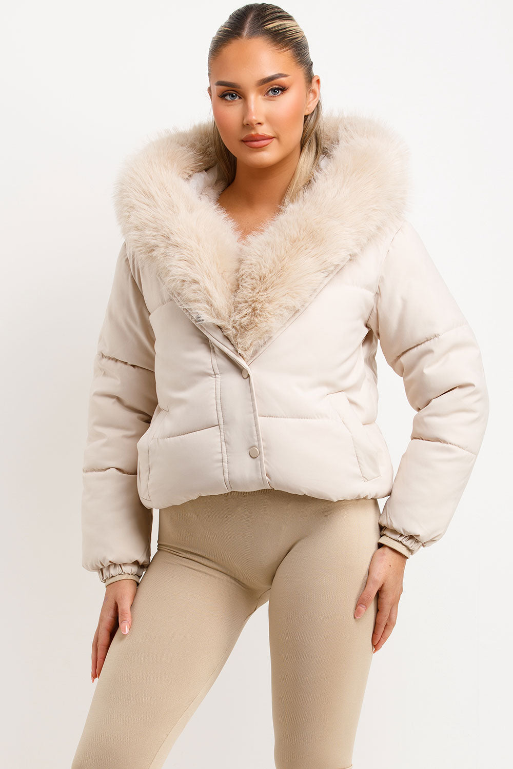 womens beige padded bomber jacket with fur hood and trim