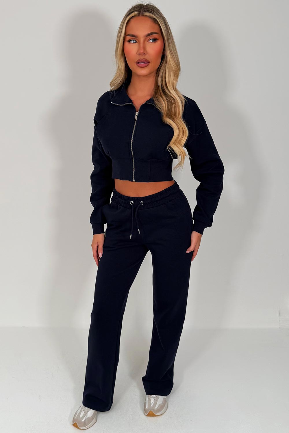 womens navy crop sweatshirt and wide leg joggers tracksuit airport outfit casual everyday outfit styledup uk