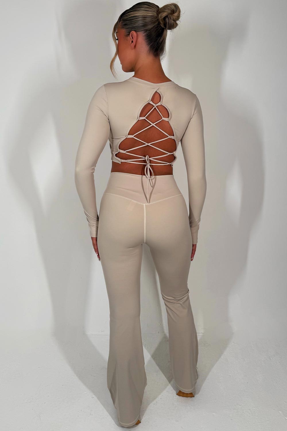 skinny flare trousers and backless crop top two piece set brown skims