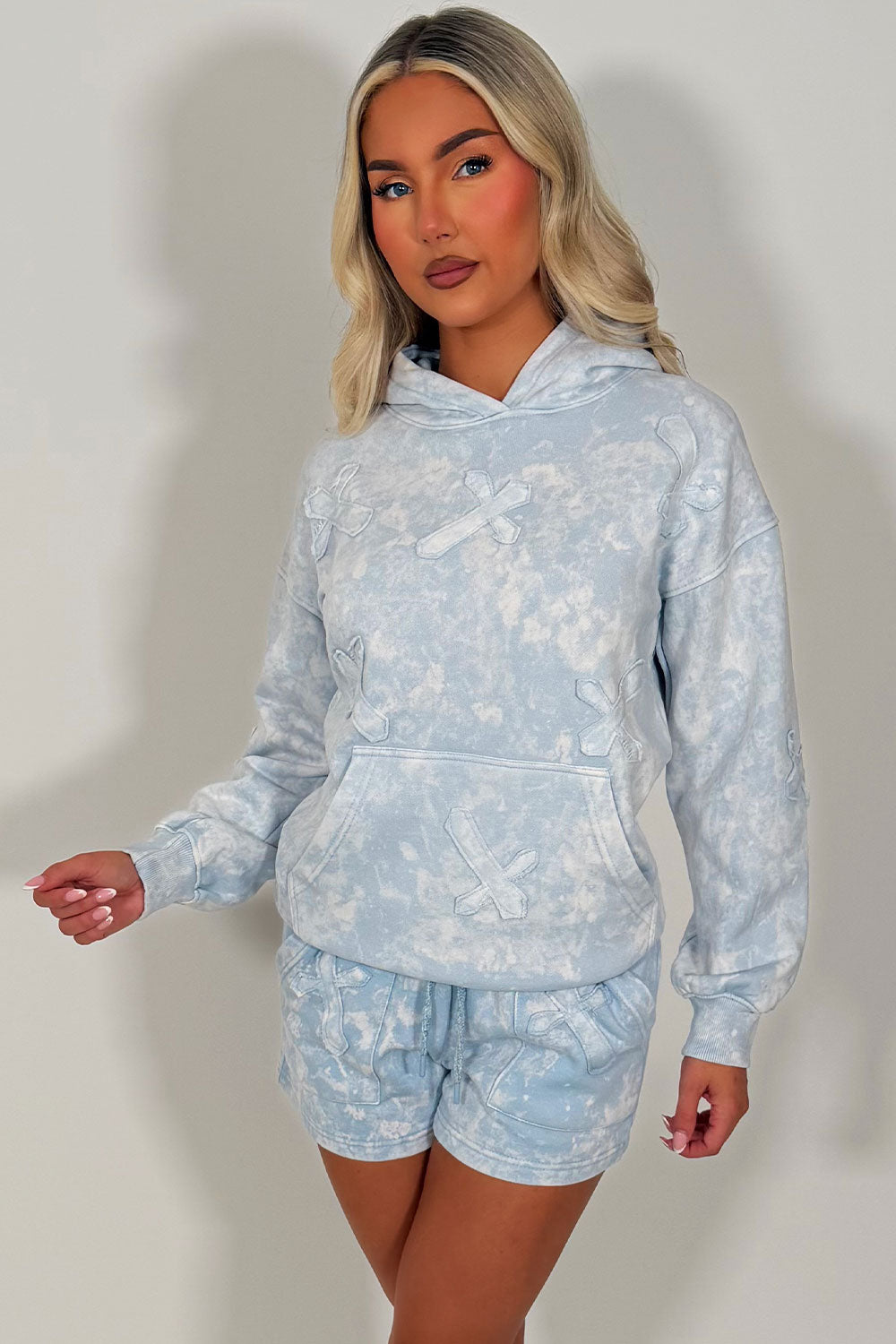 hoodie and shorts co ord with crosses applique styledup summer holiday airport outfit uk