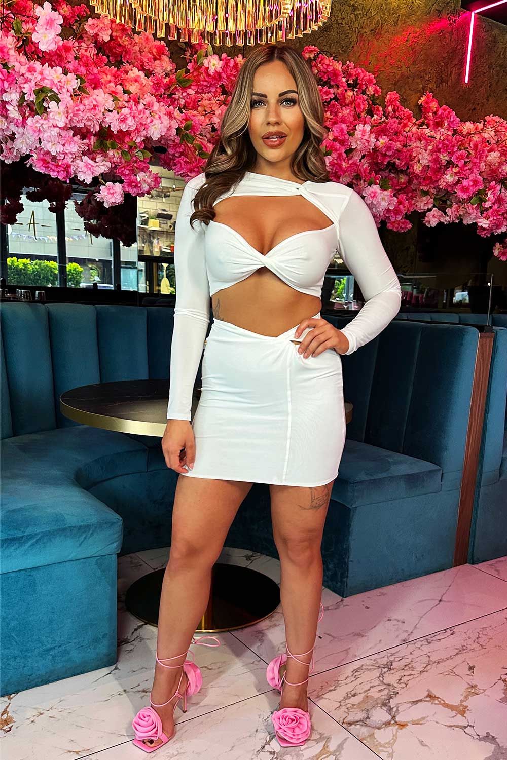 going out twisted cut out long sleeve crop top and mini bodycon skirt co ord