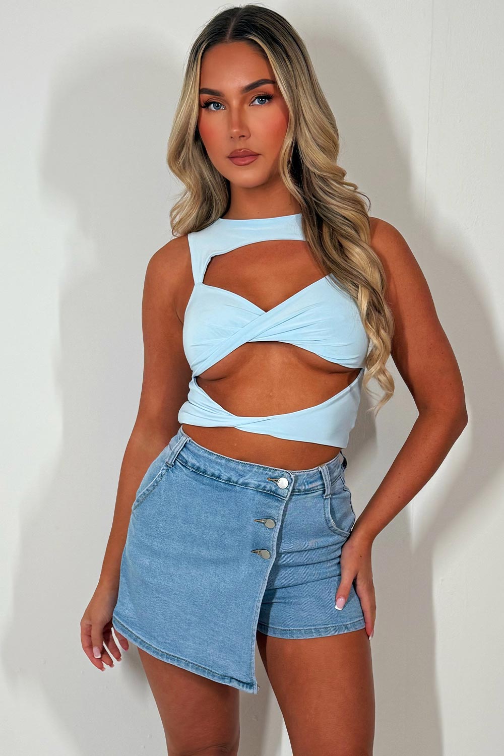 cut out sleeveless twist front festival top