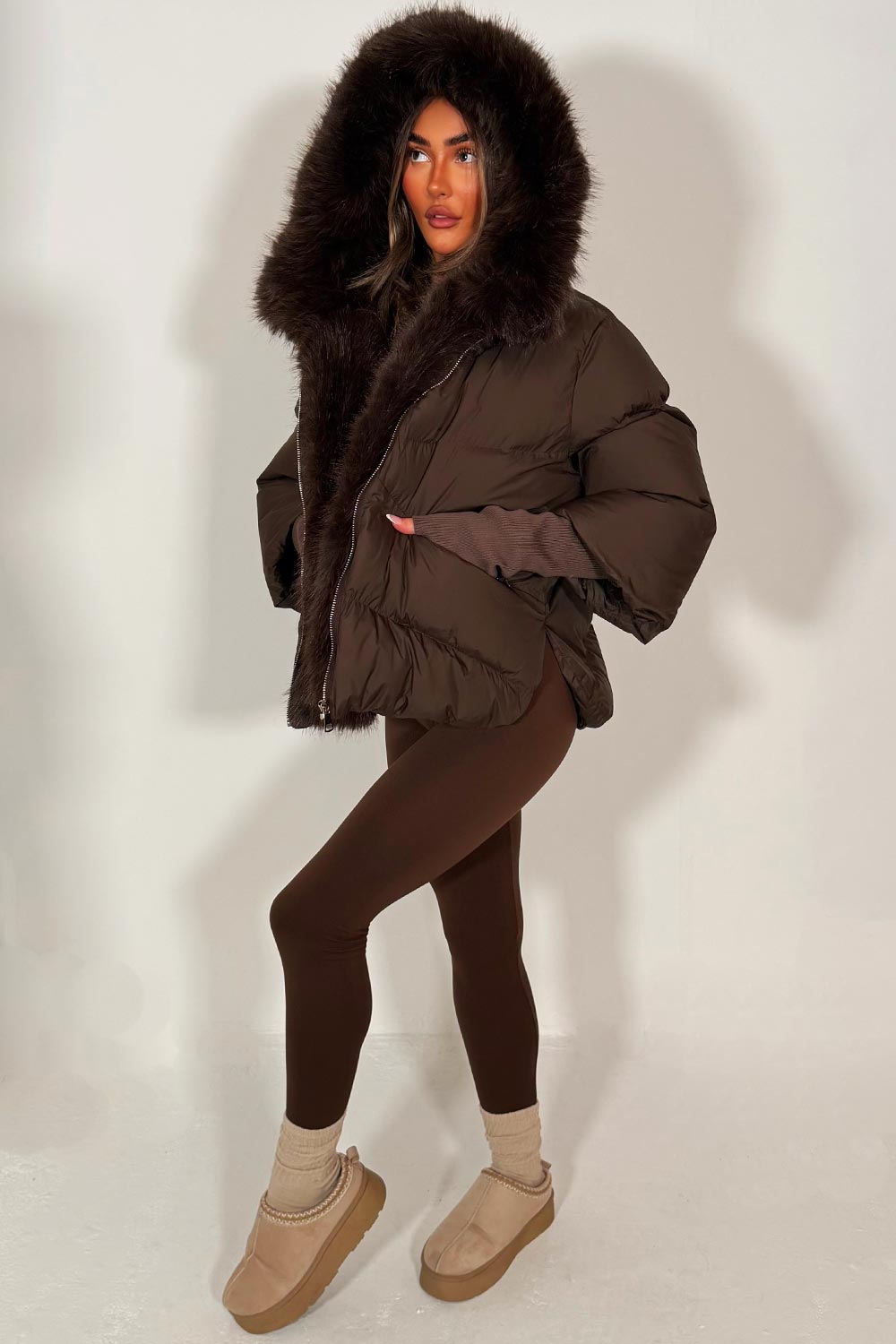 womens brown fur hood puffer jacket with fur trim on the front styledup