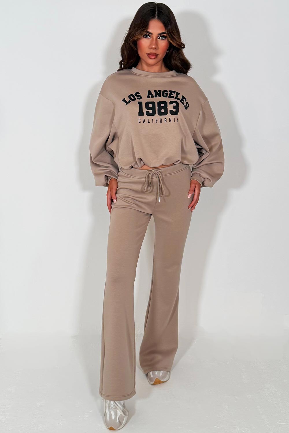 oversized sweatshirt jumper and flare trouser lounge set for womens with los angeles california slogan beige styledup