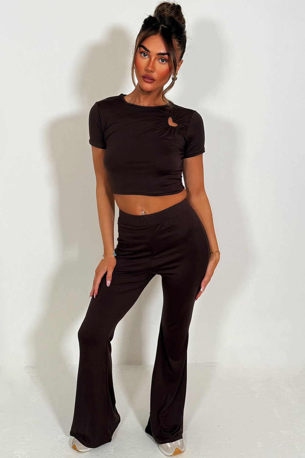 flared trousers and cut out heart detail cap sleeve crop top co ord set styled up