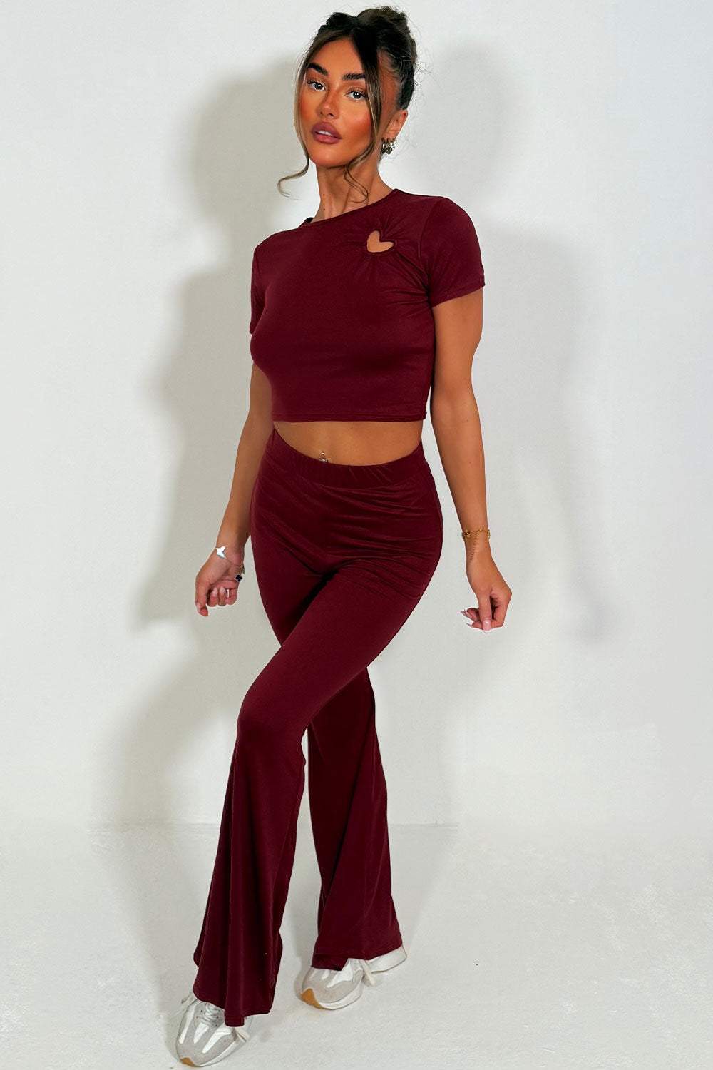 flared trousers and cut out heart detail cap sleeve crop top co ord set styled up
