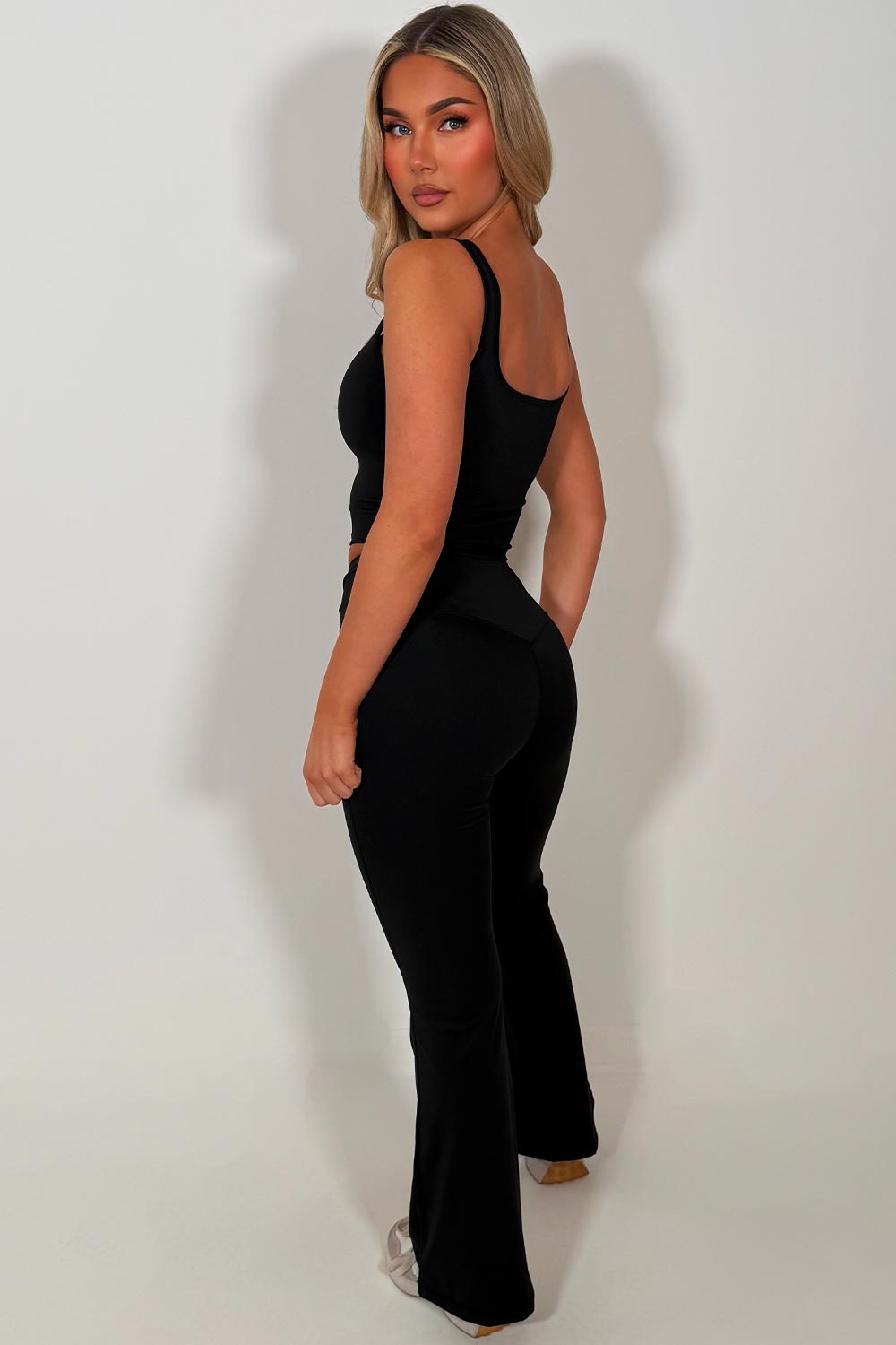 black lululemon flare yoga leggings and top co ord set pilates outfit