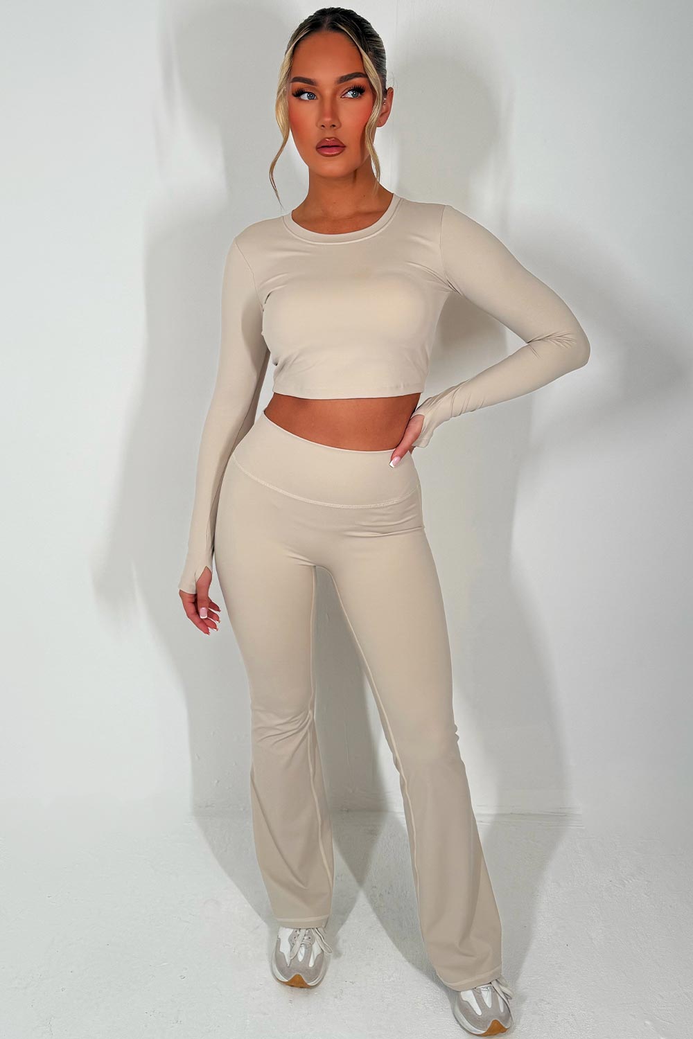 flare trousers with scrunch bum and backless sports crop top set black styledup