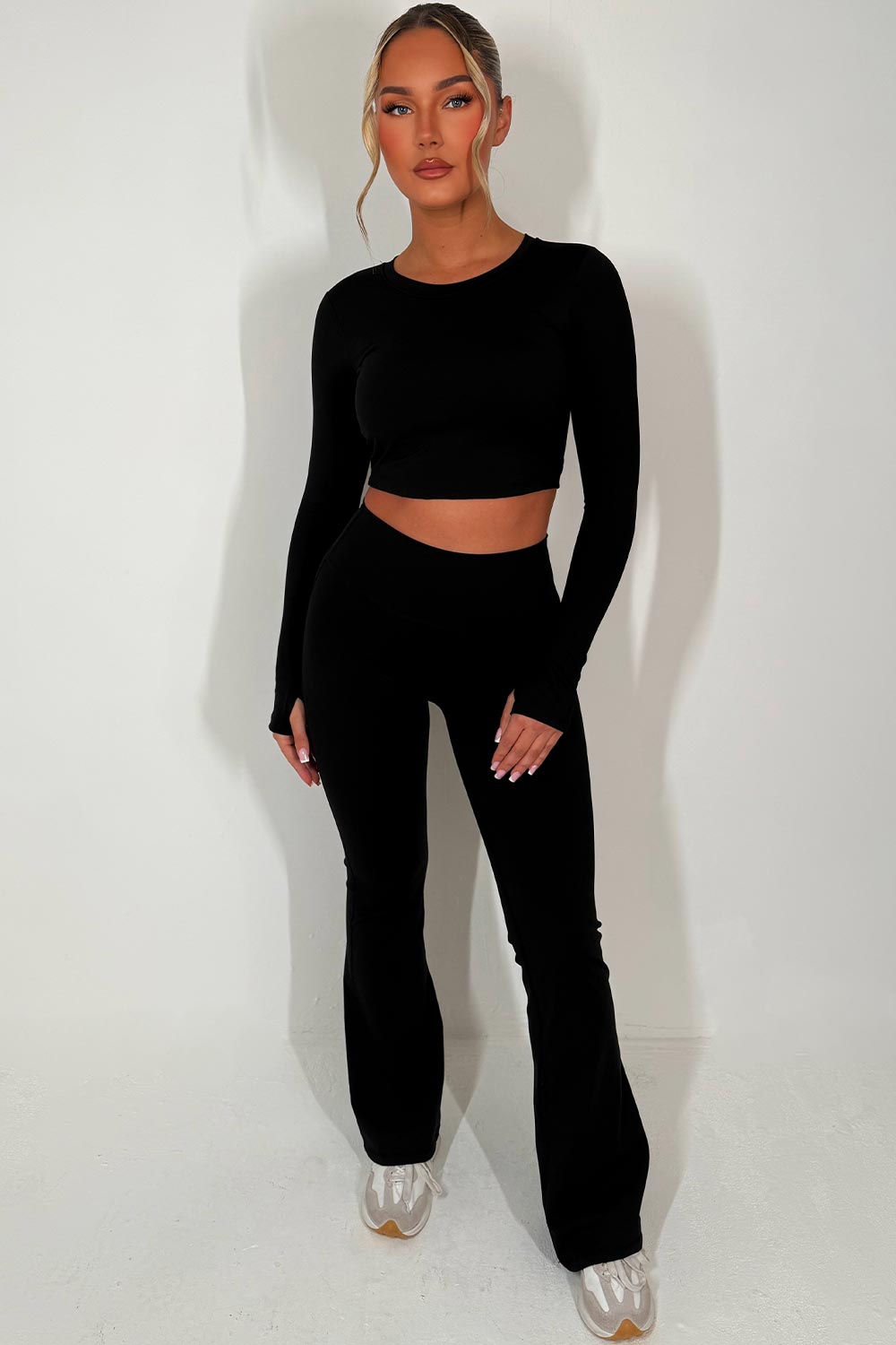 tie back crop sports top and scrunch bum flare trousers two piece set black
