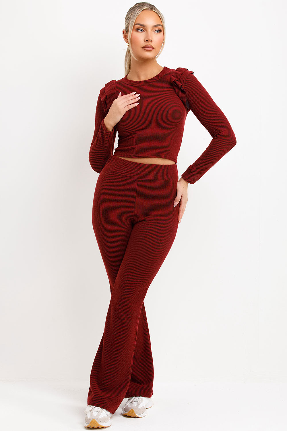 long sleeve rib top with frill ruffle shoulder and high waist skinny flare trousers loungewear co ord set womens streetwear casual outfit